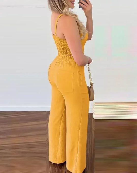 Backless jumpsuit met spaghettibandjes en V-hals