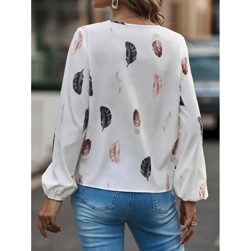 Chiffon blouse met verenpatroon