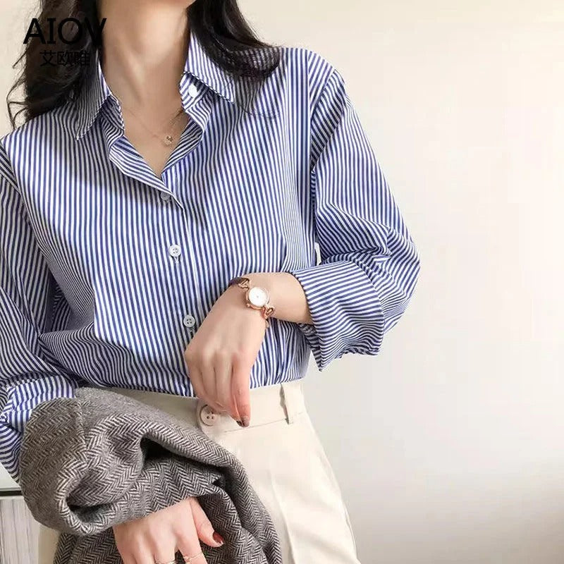 Klassiek gestreepte damesblouse